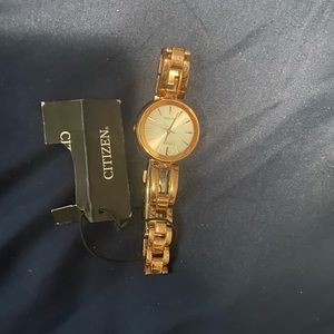Woman’s citizen watch. Rose gold. Never worn. Tags still attached.